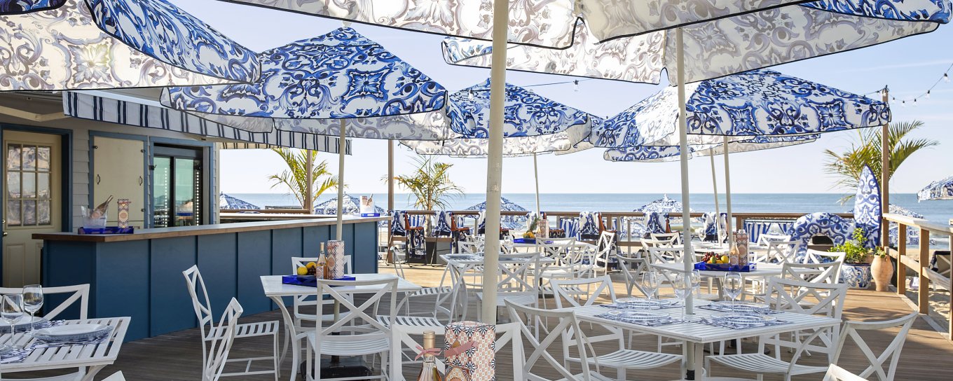 The Beach Club dotted with sun umbrellas at Gurney's Montauk Resort